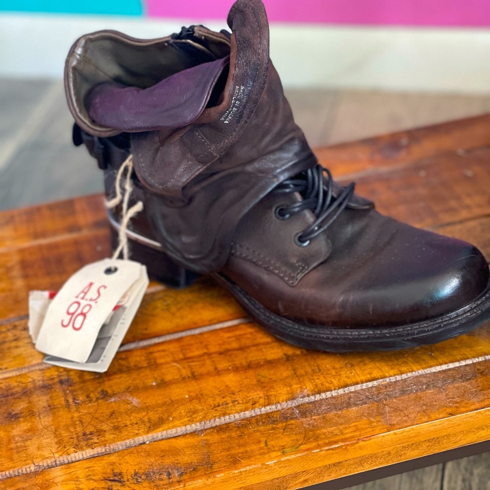 Brand New with tags lace up boots leather.